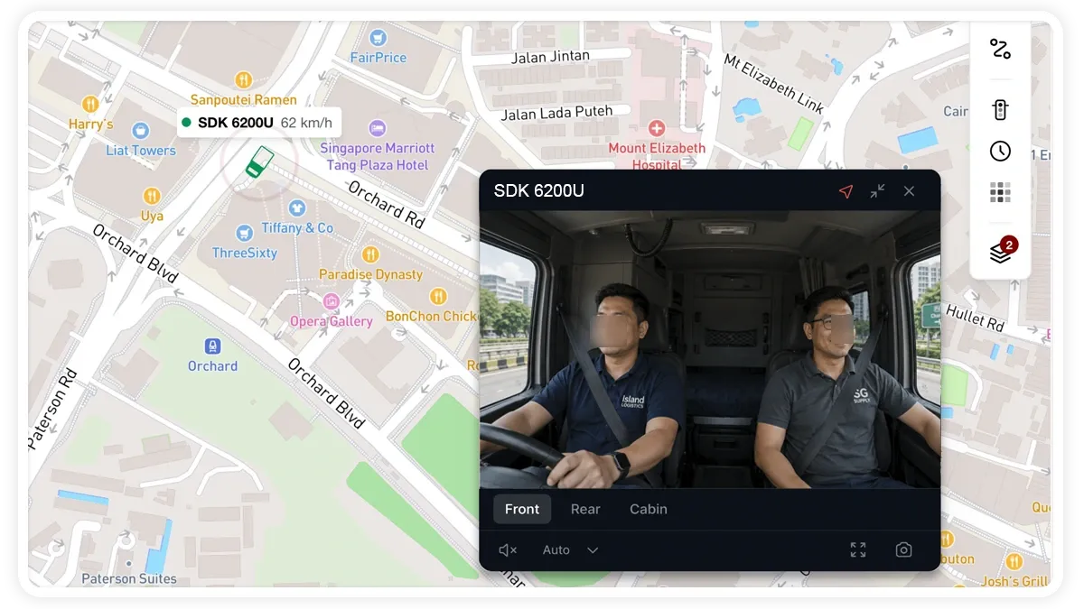 MapView trip video panel showing a live dashcam feed with Front, Rear and Cabin camera tabs and playback controls beside the vehicle on the map.